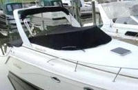 Photo of Rinker 270 Fiesta Vee, 2001: Factory Arch Bimini in Boot, Cockpit Cover, viewed from Starboard Front 