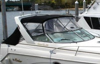 Photo of Rinker 270 Fiesta Vee, 2002: Factory OEM Bimini Top, Connector, Side Curtains, Aft Curtain, viewed from Starboard Front 