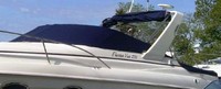 Photo of Rinker 270 Fiesta Vee, 2003: Bimini Top in Boot under Radar Arch Cockpit Cover, viewed from Port Front 