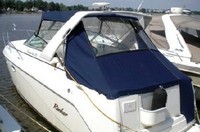 Photo of Rinker 270 Fiesta Vee, 2003: Bimini Top under Radar Arch, Front Visor, Side Curtains, Aft Curtain, viewed from Port Rear 