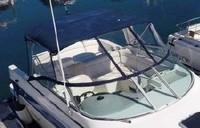 Photo of Rinker 270 Fiesta Vee, 2004: Bimini Top, Front Visor, Side Curtains, viewed from Starboard Front, Above 