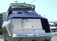 Photo of Rinker 270 Fiesta Vee, 2004: Bimini Connector, Side Curtains, viewed from Port Rear 