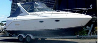 Photo of Rinker 270 Fiesta Vee, 2004: Bimini Connector, Side Curtains, viewed from Starboard Side 
