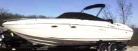 Photo of Rinker 272 Cuddy, 2000: Bimini Top in Boot, Cockpit Cover, viewed from Port Front 