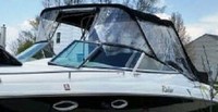 Photo of Rinker 272 Cuddy, 2001: Bimini Top, Front Connector, Side and Aft Curtains, viewed from Port Front 