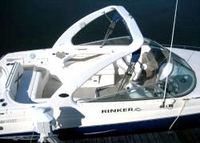 Photo of Rinker 282 Cuddy, 2007: Factory Radar Arch Bimini Top in Boot, viewed from Starboard Side 
