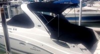 Photo of Rinker 290 Express Cruiser, 2013: Arch Camper Top, Cockpit Cover, viewed from Port Side 