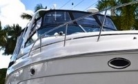 Photo of Rinker 300 Express Cruiser, 2006: Bimini, Front Connector, Side Curtains, Camper Top, Camper Side Curtains, viewed from Starboard Front 