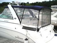 Photo of Rinker 300 Express Cruiser, 2007: Bimini, Front Connector, Side Curtains, Camper Top, Camper Side and Aft Curtains, viewed from Port Rear 