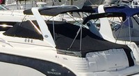 Photo of Rinker 300 Express Cruiser, 2008: Bimini Top, Camper Top in Boot, Cockpit Cover, viewed from Port Rear, Above 