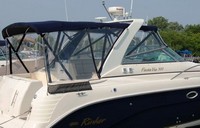 Photo of Rinker 300 Fiesta Vee, 2005: Bimini Top, Front Connector, Side Curtains, Camper Top, Camper Side Curtains, viewed from Starboard Rear 