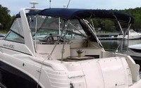 Photo of Rinker 300 Fiesta Vee, 2005: Bimini Top, Front Connector, Side Curtains, Camper Top, viewed from Port Rear 
