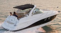 Photo of Rinker 310 Express Cruiser, 2014: Arch Hard-Top, Front Visor, Camper Top (Factory OEM website photo), viewed from Starboard Rear 