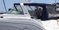 Photo of Rinker 342 Express Cruiser, 2006: Bimini Top, Side Curtains, Camper Top, Camper Side and Aft Curtains, viewed from Port Rear 