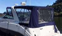 Photo of Rinker 342 Express Cruiser, 2006: Camper Top, Camper Side Curtains, Camper Aft Curtain with Snaps, viewed from Port Rear 