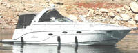 Photo of Rinker 360 Express Cruiser Bimini, 2006: Bimini Top, Connector, Side Curtains, Camper Top, Camper Side Aft Curtains, viewed from Starboard Side 