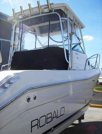 Photo of Robalo 235WA, 20045 Hard-Top, Front Connector, Side Curtains, Aft-Drop-Curtain, viewed from Starboard Rear 