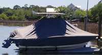 Photo of Scout 195SF 20xx T-Top Boat-Cover on Float with Sand Bags, viewed from Starboard Side 