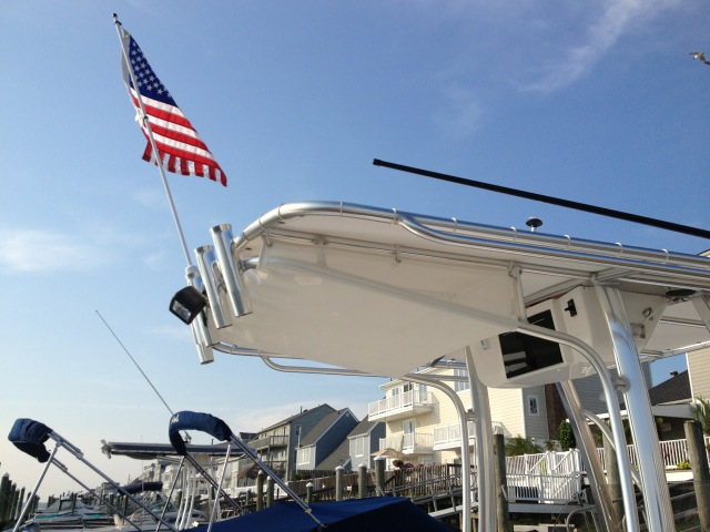 New OEM White Sunbrella&reg; canvas and new, OEM white (custom color) Phifertex&reg; Gear-Net on 
		2012 Sea Hunt&reg; Triton 210cc factory OEM T-Top