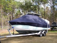 Sea-Pro® 228CC T-Top-Boat-Cover-Elite™ Custom fit TTopCover(tm) (Elite(r) Top Notch(tm) 9oz./sq.yd. fabric) attaches beneath factory installed T-Top or Hard-Top to cover boat and motors