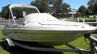 Photo of Sea Ray 176 Bowrider, 2002: Bimini Top in Boot, Bow Cover Cockpit Cover, viewed from Starboard Front 
