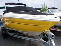Photo of Sea Ray 200 Bowrider Select, 2004: Bimini Top in Boot, Bow Cover Cockpit Cover, viewed from Starboard Front 