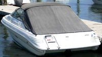 Photo of Sea Ray 200 Overnighter IO, 1993: Convertible Top, Side Curtains, Aft Curtain, viewed from Port Rear 