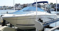 Photo of Sea Ray 210 Dual Console, 1999: Bimini Top in Boot, Bow Cover Cockpit Cover, viewed from Port Front 