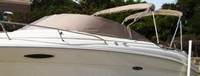 Photo of Sea Ray 225 Weekender, 2001: Bimini Top in Boot, Camper Top in Boot, Cockpit Cover with Bimini and Camper Cusouts, Toast Tweed Sunbrella, viewed from Port Front 