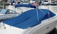 Photo of Sea Ray 225 Weekender, 2001: Bimini Top in Boot, Cockpit Cover with Bimini Cutouts, viewed from Starboard Rear 