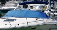 Photo of Sea Ray 225 Weekender, 2004: Bimini Top in Boot, Cockpit Cover, viewed from Port Front 