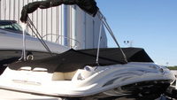Photo of Sea Ray 240 Sundeck, 2005: Factory OEM Bimini Top in Boot, Cockpit Cover-, Bow Cover, viewed from Starboard Rear 