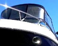 Photo of Sea Ray 250 Amberjack, 2007: Bimini Top, Bimini Visor, Bimini, Side and Aft Curtains, viewed from Port Front 