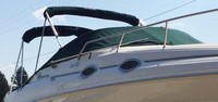 Photo of Sea Ray 260 Sundancer NO Arch, 2000: Bimini Top in Boot, Camper Top in Boot, Cockpit Cover with Bimini and Camper Top Cutouts, viewed from Starboard Front 
