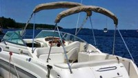 Photo of Sea Ray 260 Sundancer NO Arch, 2001: Bimini Top in Boot, Camper Top in Boot, viewed from Port Rear 
