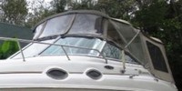 Photo of Sea Ray 260 Sundancer NO Arch, 2003: Bimini Top, Visor, Side Curtains, Camper Top, Camper Aft Curtain, viewed from Port Front 