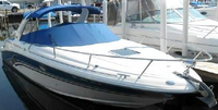 Photo of Sea Ray 290 Sun Sport Arch, 2001: Bimini Top, Sunshade Top, Cockpit Cover, viewed from Starboard Front 