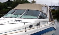 Photo of Sea Ray 290 Sundancer Arch, 1995: Convertible Top, Side Curtains, Camper Top, Camper Side Curtains, viewed from Port Front 