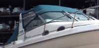 Photo of Sea Ray 290 Sundancer Arch, 1995: Convertible Top, Side Curtains Convertible Aft Curtain, viewed from Starboard Front 