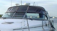 Photo of Sea Ray 330 Express Cruiser, 1997: Bimini Top, Front Visor, Side Curtains, Sunshade Top, Sunshade Aft Curtain, viewed from Port Front 
