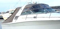 Photo of Sea Ray 330 Express Cruiser, 1997: Bimini Top, Front Visor, Side Curtains, Sunshade Top, Sunshade Aft Curtain, viewed from Starboard Front 