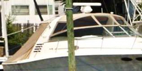 Photo of Sea Ray 330 Express Cruiser, 1998: Bimini Top, Front Visor, Side Curtains, Sunshade Top, Sunshade Aft Curtain, viewed from Starboard Front 