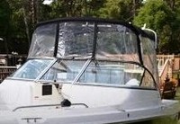 Photo of SeaSwirl Striper 2101DC, 2009: Bimini Top, Front Connector, Side Curtains, viewed from Port Front 