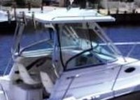 Photo of Seaswirl Striper 2301WA, 2005: Hard-Top, Connector, Side Curtains, viewed from Starboard Side 