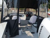 Photo of Smoker Craft 172 Osprey, 2015: Convertible Top Convertible Side Curtains, Aft Curtain Zipped Open Black Polyester, Rear 