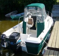 Photo of Trophy 1802 WA, 2004: Factory Bimini Top, Front Connector, Side Curtains, Aft-Drop-Curtain, Rear 
