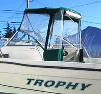 Photo of Trophy 1802 WA, 2006: Factory Bimini Top, Front Connector, Side Curtains, Aft-Drop-Curtain, viewed from Port Rear 