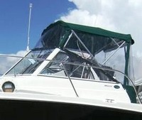 Photo of Trophy 1952 WA, 2009: Bimini Top, Front Connector, Side Curtains, Aft-Drop-Curtain, viewed from Port Side 
