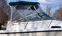 Photo of Trophy 2302 WA, 2002: Bimini Top, Front Connector, Side Curtains, Aft-Drop-Curtain, viewed from Starboard Side 