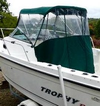Photo of Trophy 2302 WA, 2004: Bimini Top, Front Connector, Side Curtains, Aft-Drop-Curtain, viewed from Starboard Rear 